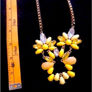Fashion accessory necklace yellow easy to wear creates a new outfit with flare !